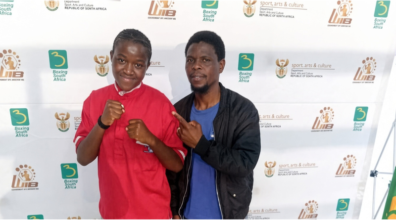 Mpumalanga featherweight boxer Nosimphiwe Danger Zone with her coach and manager Buti Isaac Dhlamini (Image: Supplied)